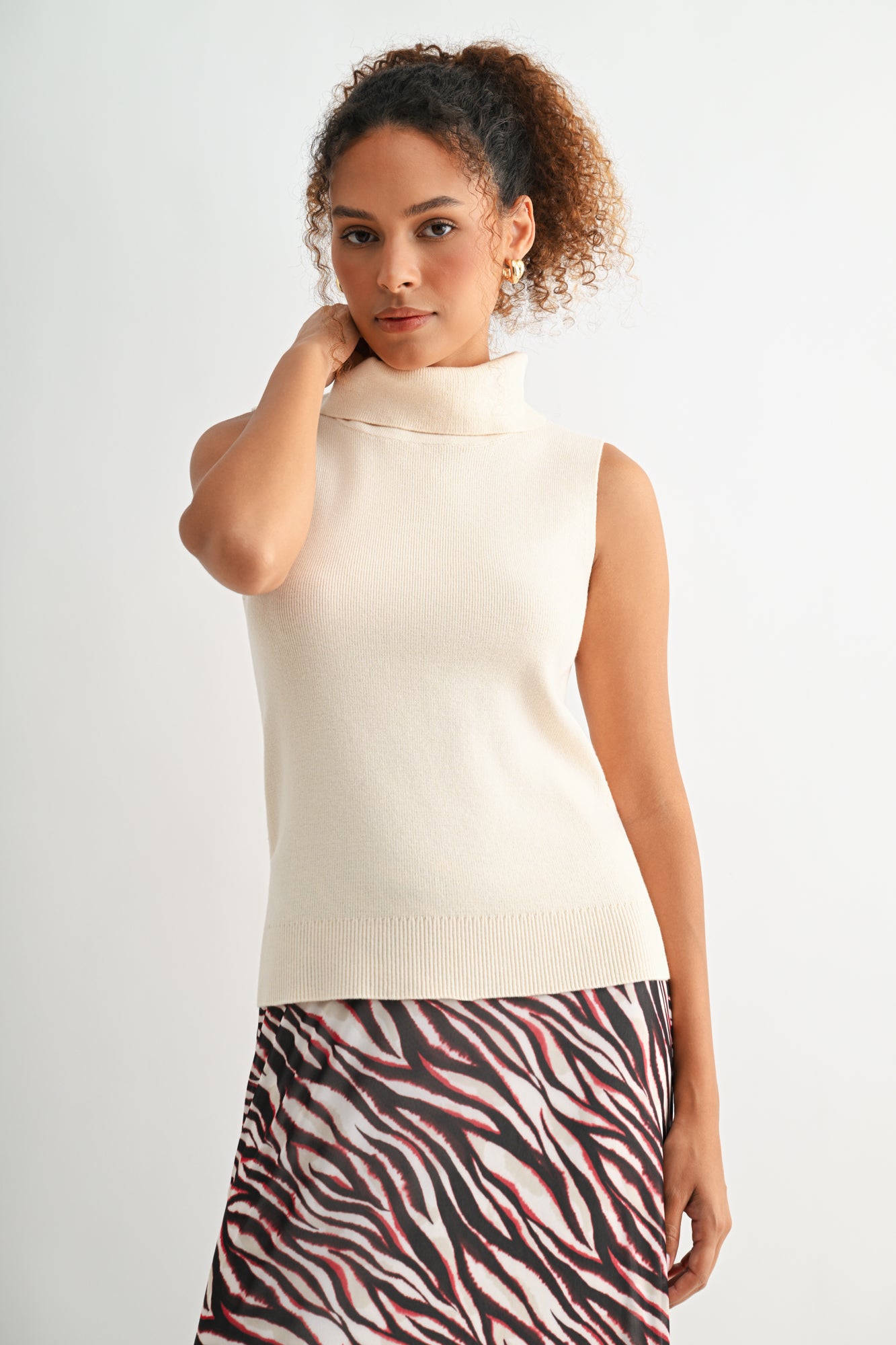 Bone White sleeveless turtleneck sweater