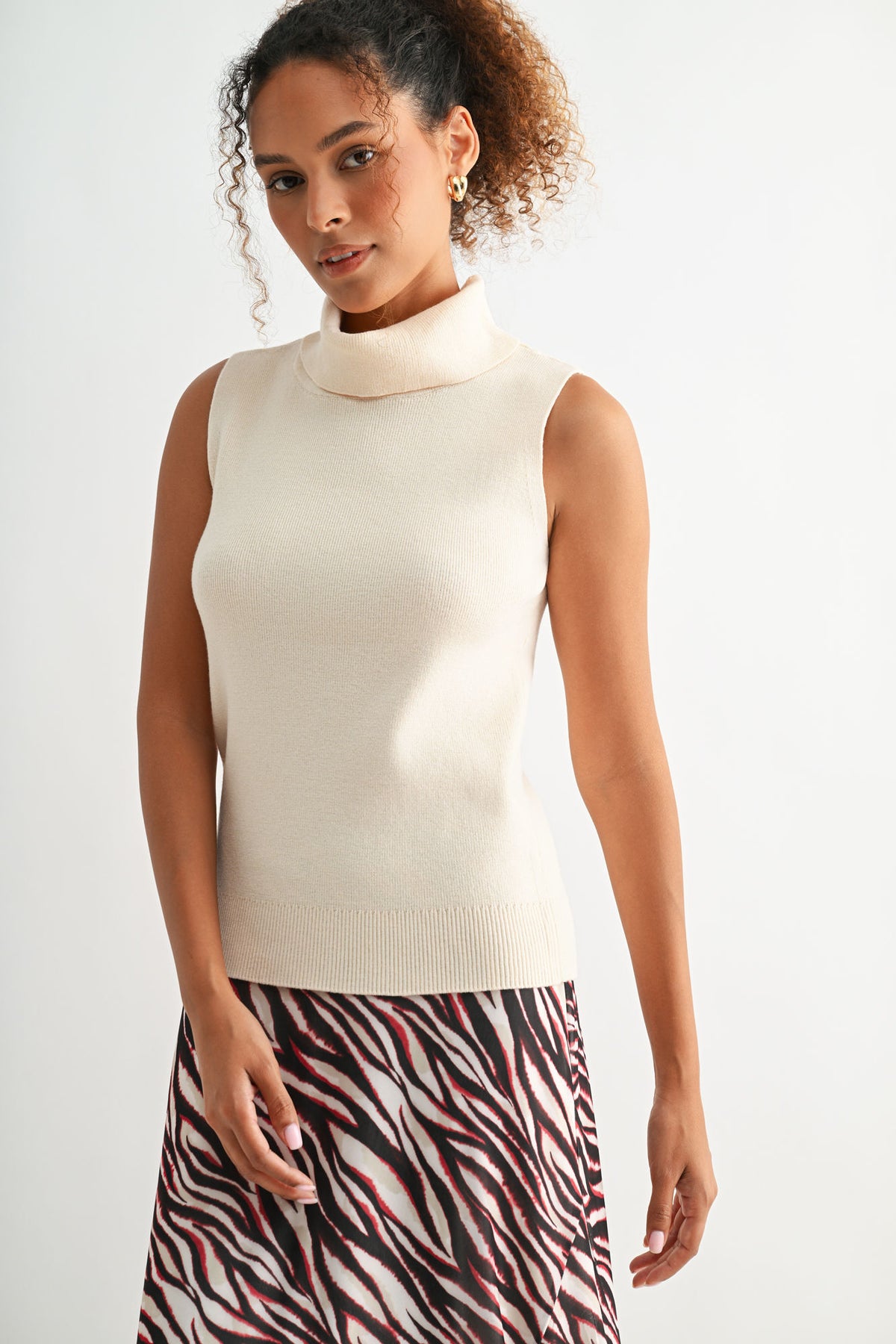 Bone White sleeveless turtleneck sweater