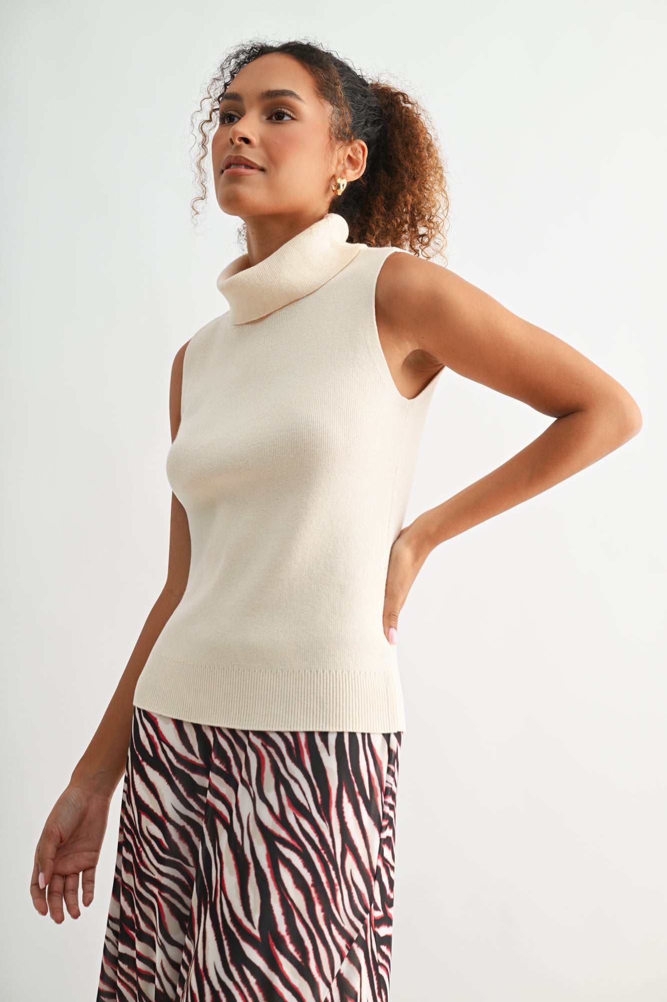 Bone White sleeveless turtleneck sweater