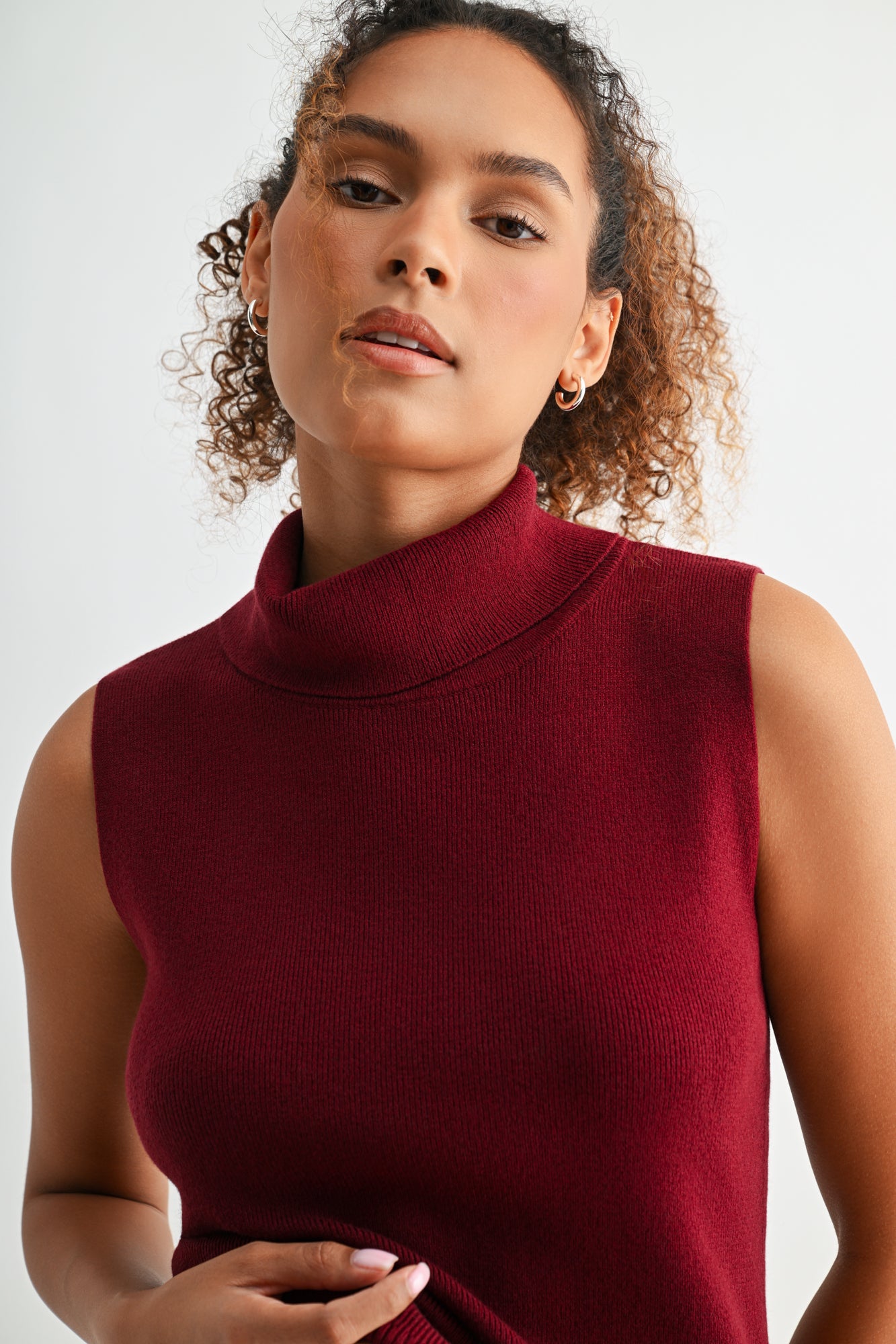 Cherry sleeveless turtleneck sweater