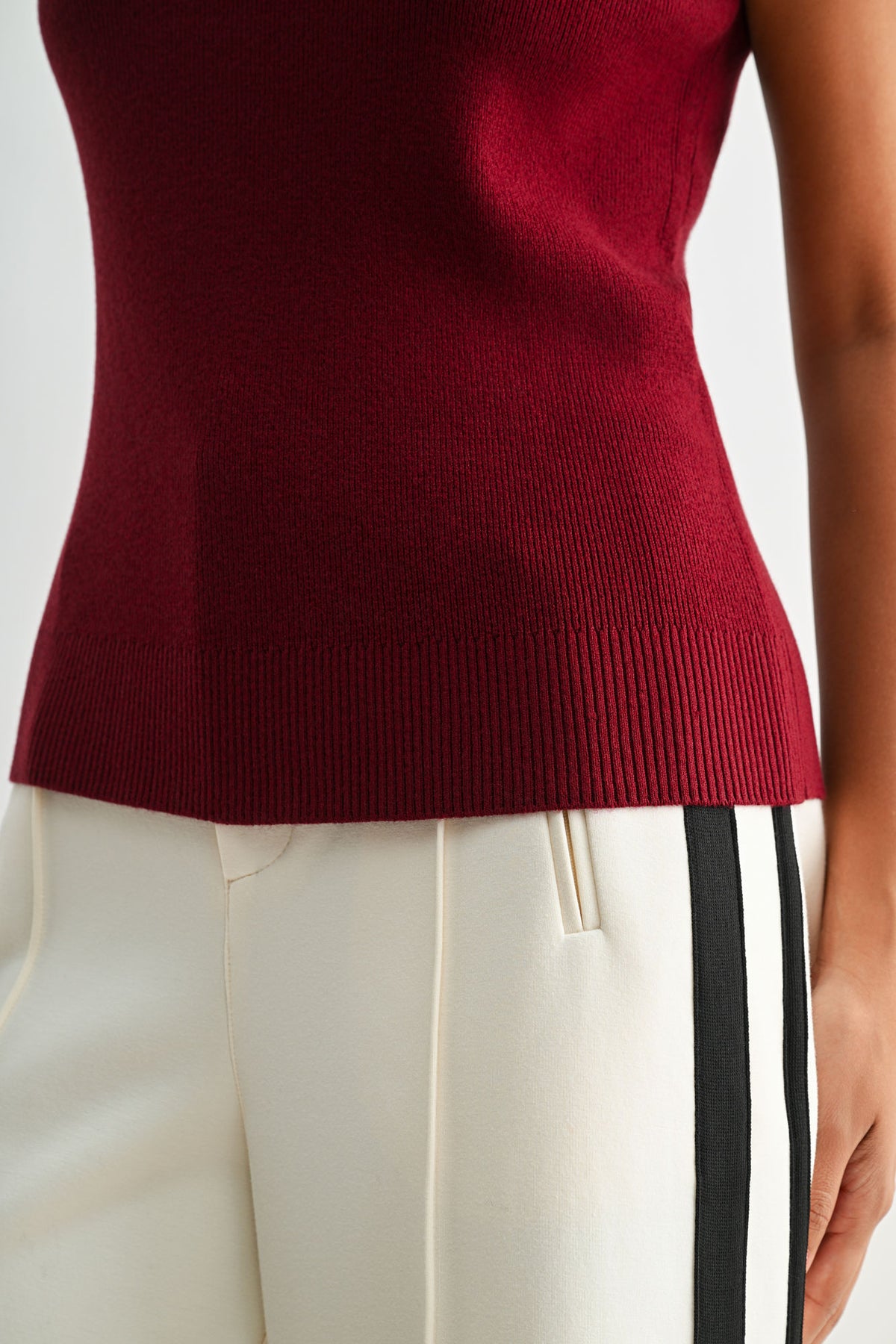 Cherry sleeveless turtleneck sweater