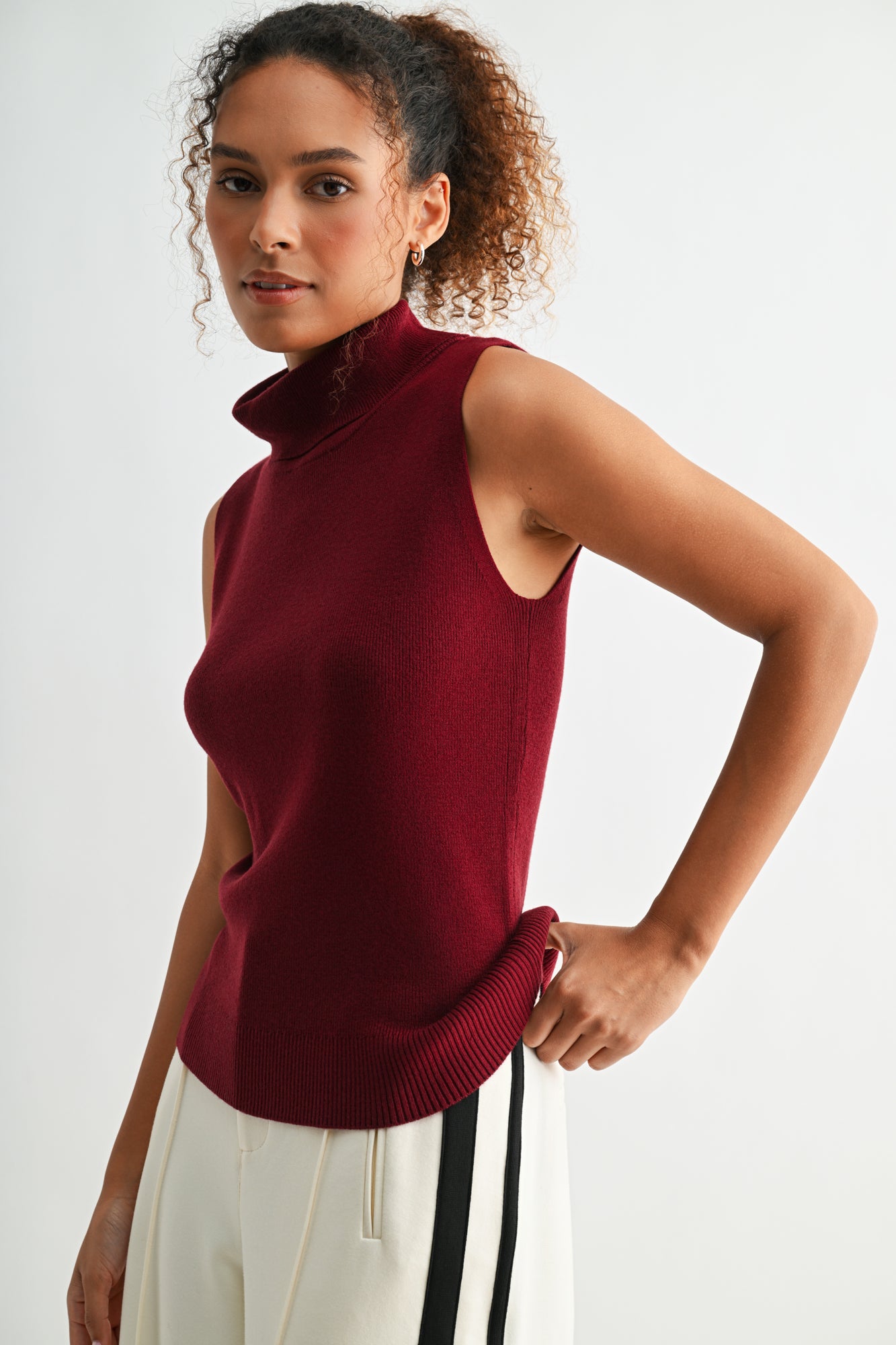 Cherry sleeveless turtleneck sweater