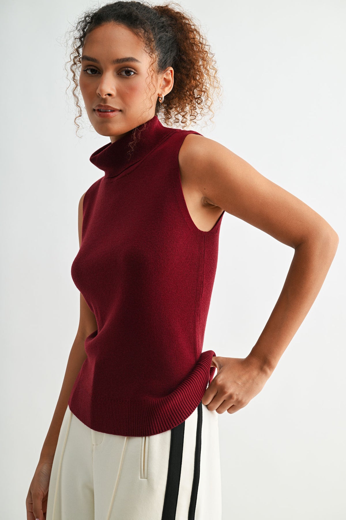 Cherry sleeveless turtleneck sweater