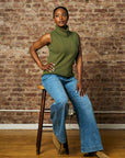 Olive sleeveless turtleneck sweater