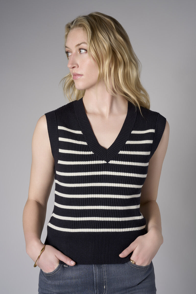 Redefine chic with the 'Black' Sleeveless Sweater – the perfect finishing touch.