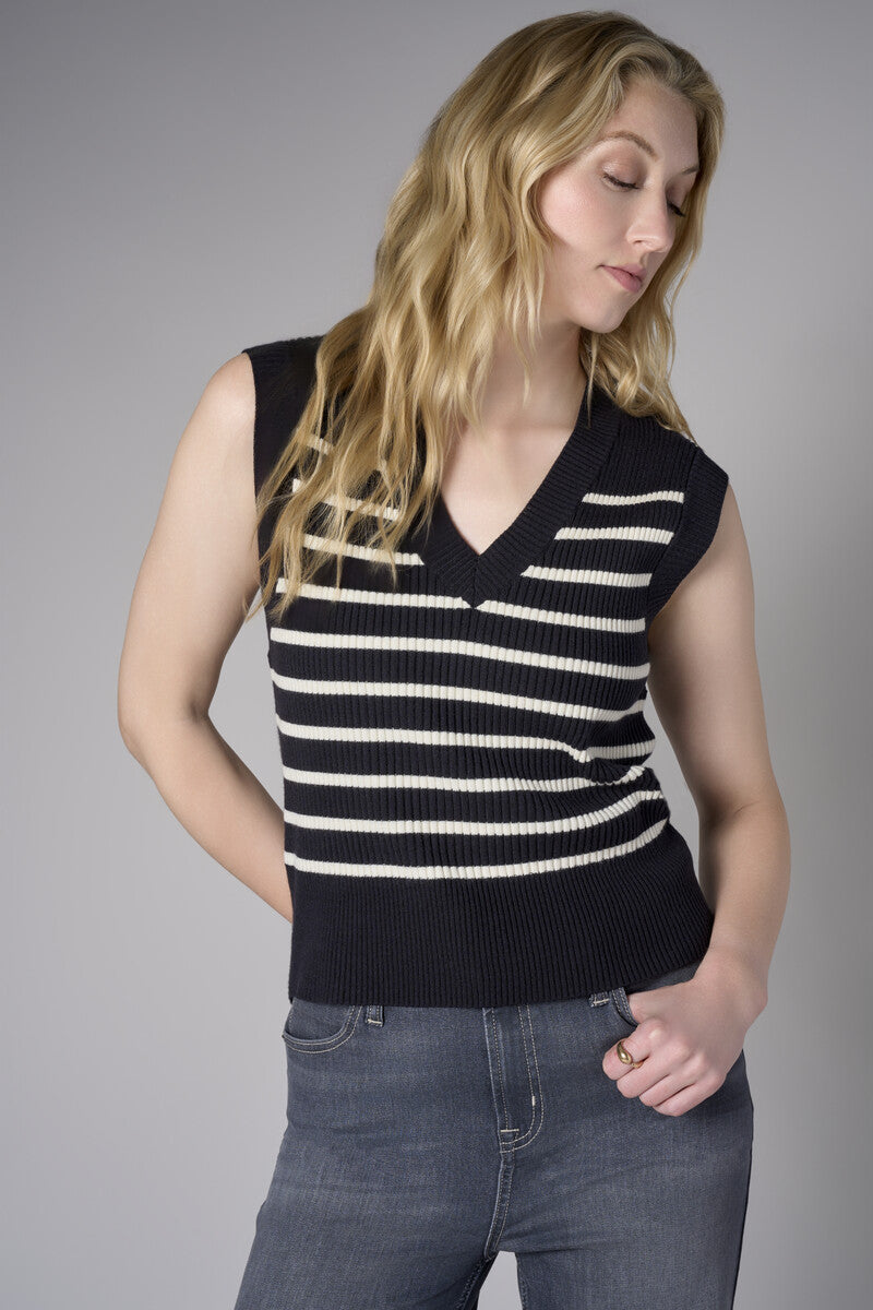 Redefine chic with the 'Black' Sleeveless Sweater – the perfect finishing touch.