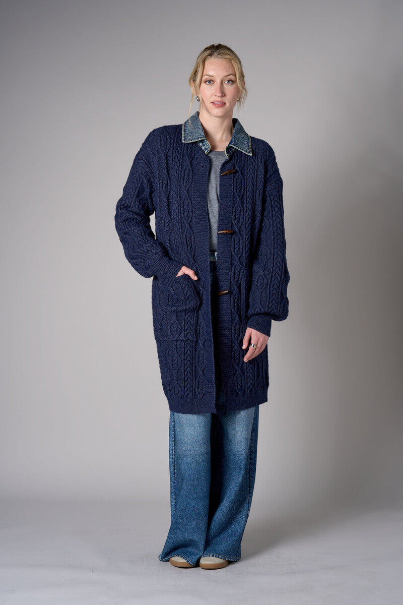 Twilight cardigan with denim collar and button front closure.