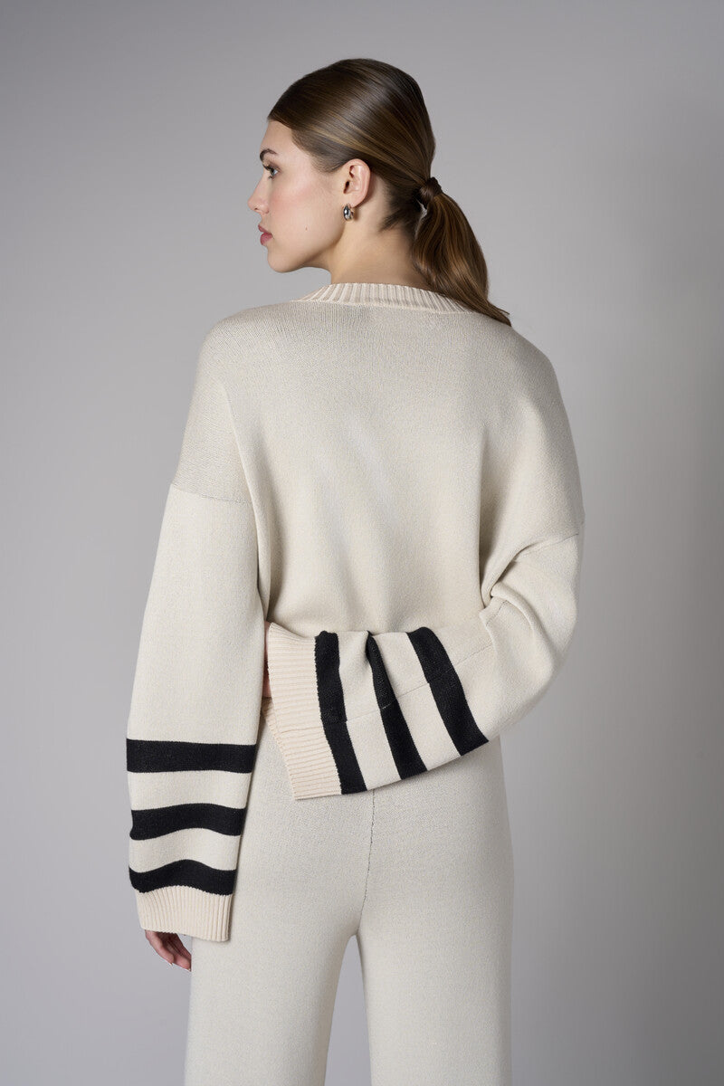 The 'Sand' Striped Sleeve Sweater: designed for bold appeal.