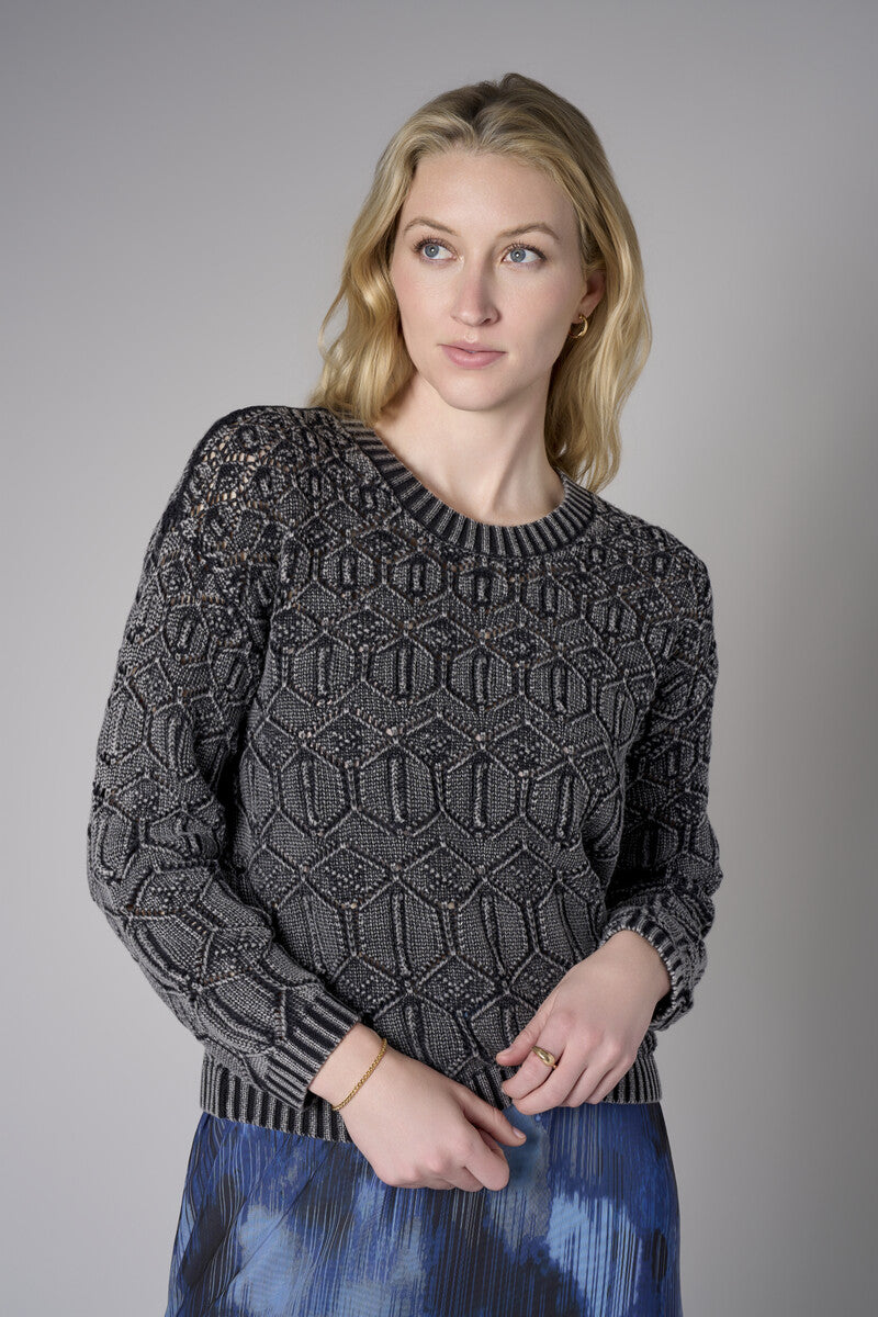 Turn heads with this warm 'Black' Crew Neck Distressed Sweater.