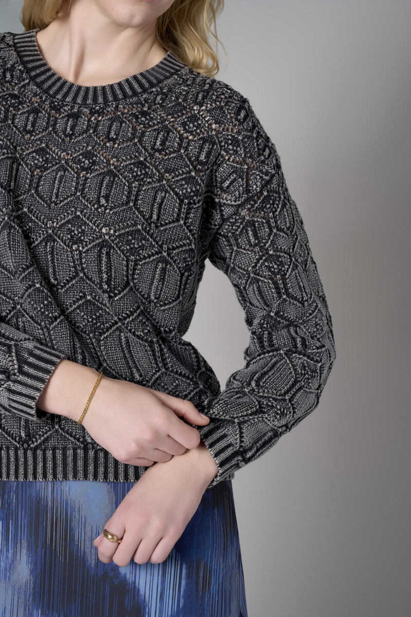 Turn heads with this warm &#39;Black&#39; Crew Neck Distressed Sweater.