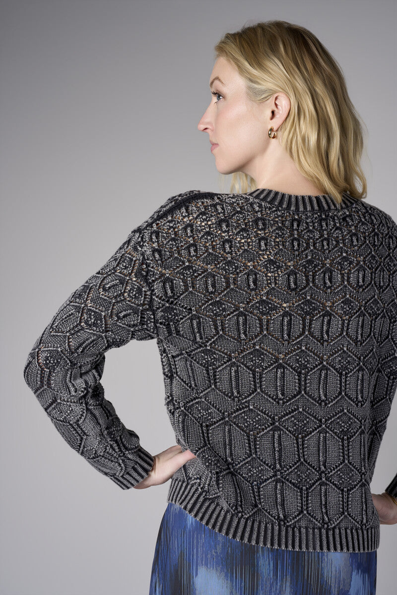 Turn heads with this warm &#39;Black&#39; Crew Neck Distressed Sweater.
