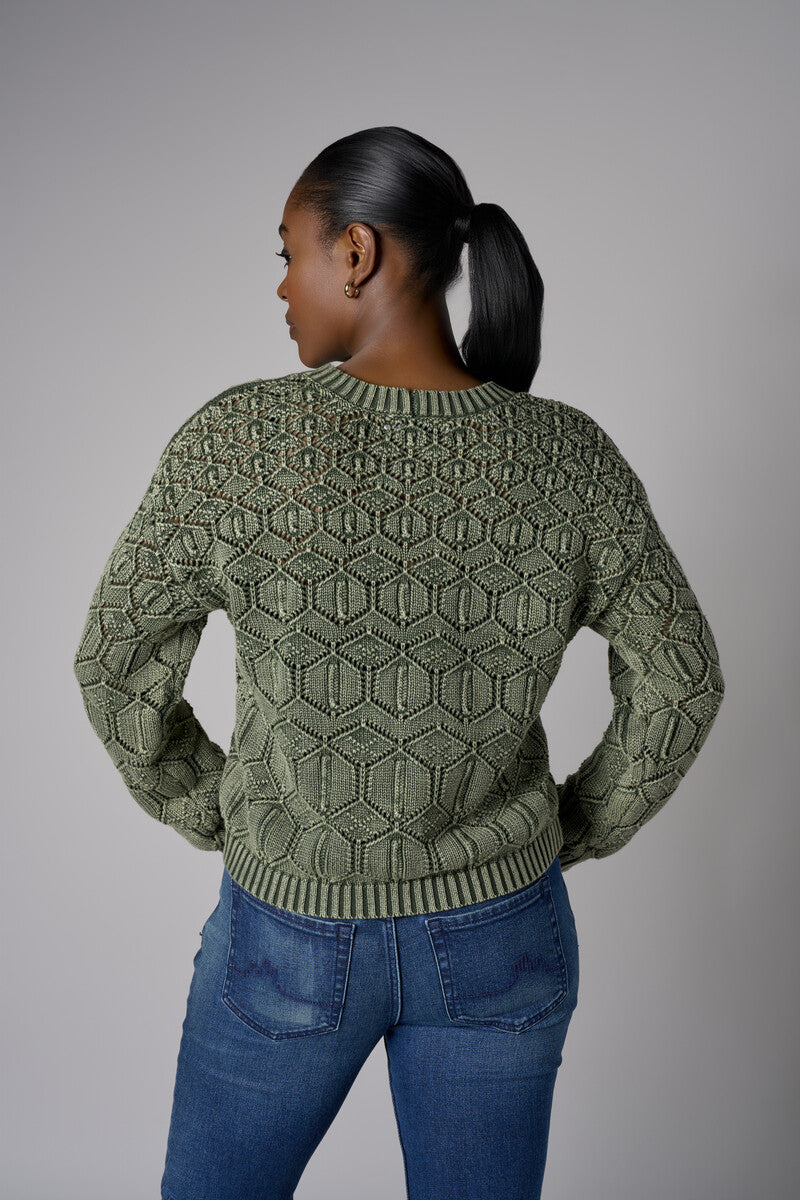 Fall in love with the distinctive &#39;Olive&#39; Crew Neck Distressed Sweater – a must-have for any wardrobe.