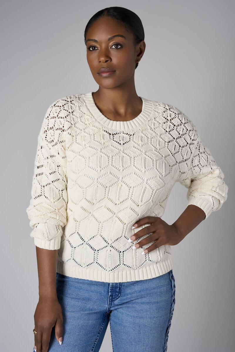Embrace the beauty of 'Sand' in our signature Crew Neck Distressed Sweater.