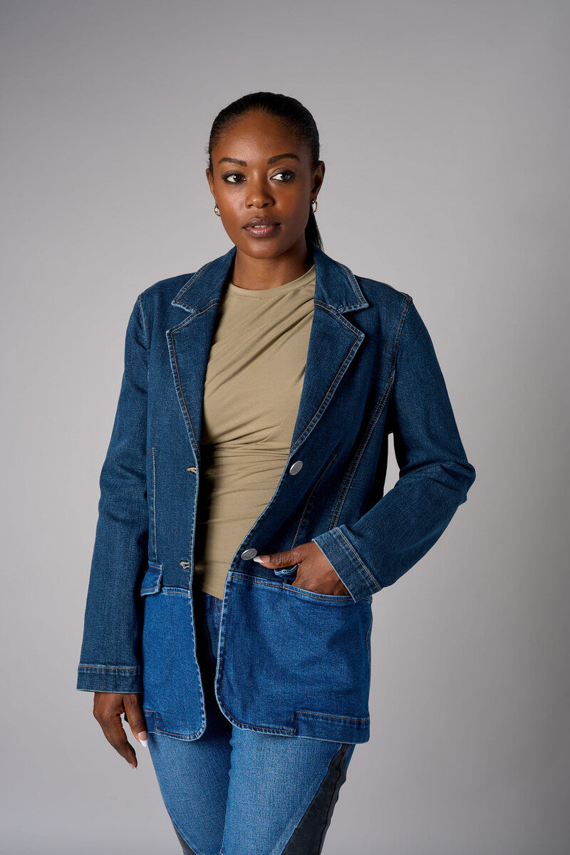 Two tone denim blazer with button front closure and front flap pockets.