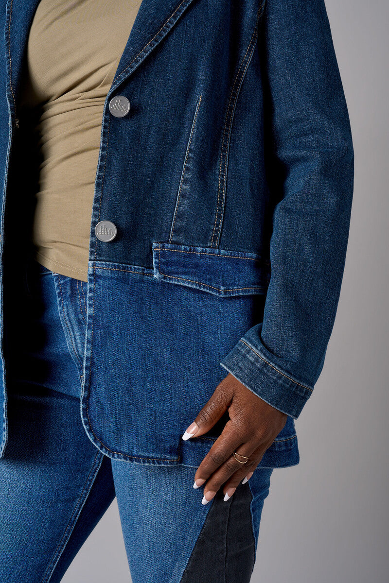 Two tone denim blazer with button front closure and front flap pockets.