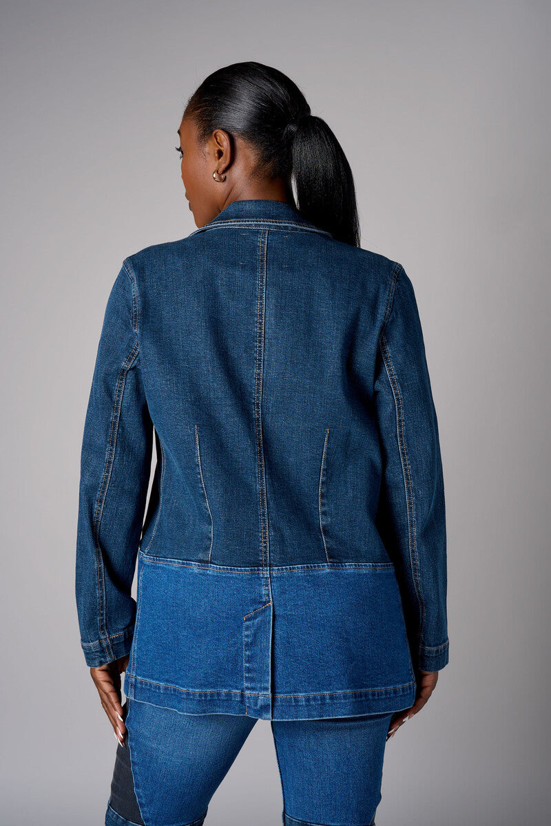 Two tone denim blazer with button front closure and front flap pockets.