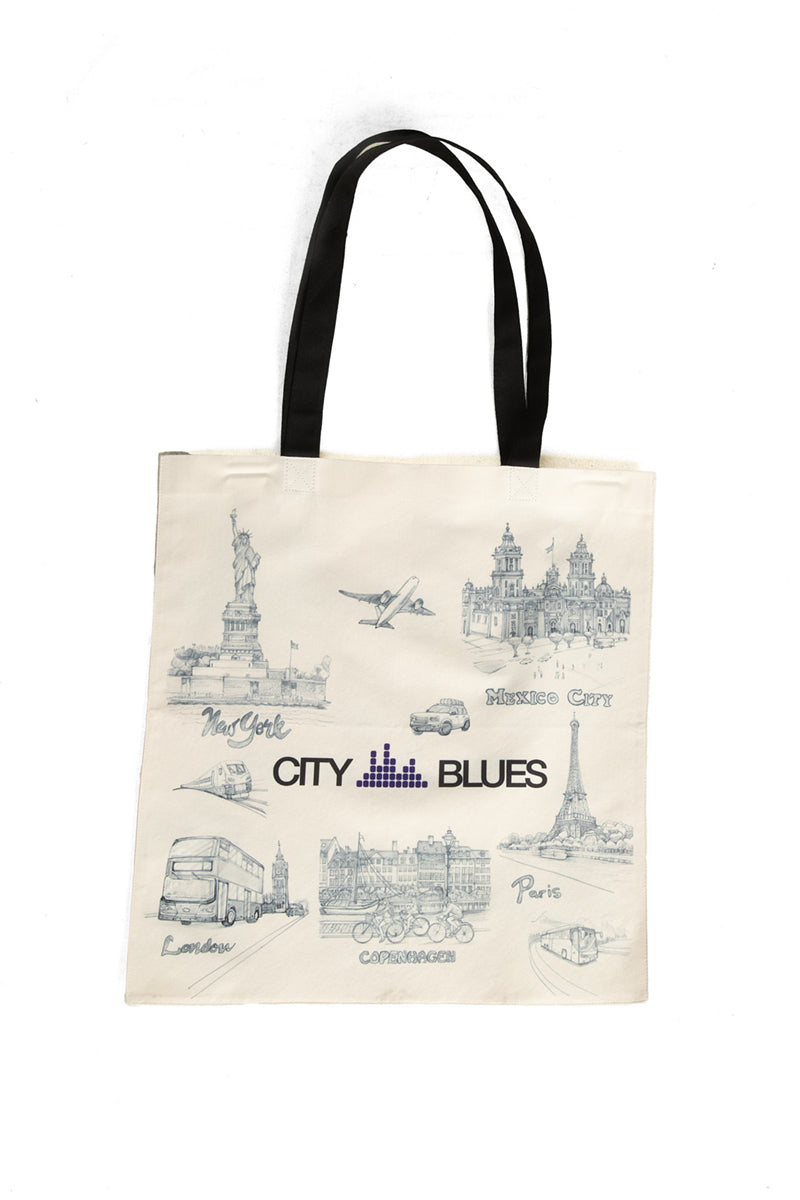 Tote bag with cityscape illustrations and 'City Blues' logo on a white background